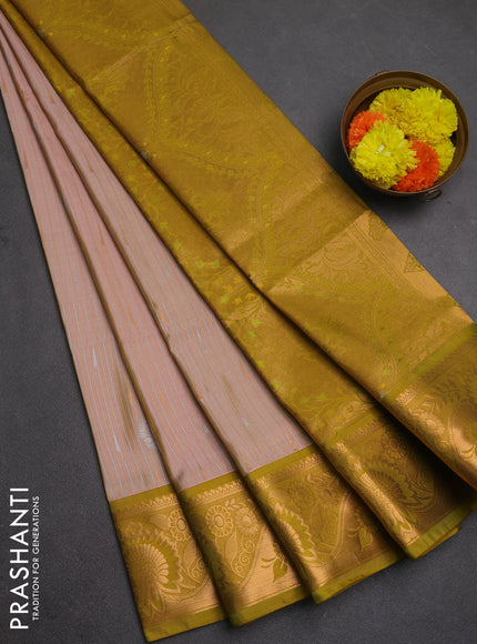 Semi soft silk saree peach shade and lime green with allover silver & gold zari weaves & buttas and zari woven border