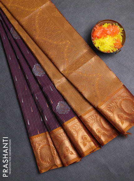 Semi soft silk saree deep wine and dark mustard with allover silver & gold zari weaves & buttas and zari woven border