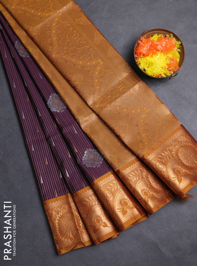 Semi soft silk saree deep wine and dark mustard with allover silver & gold zari weaves & buttas and zari woven border