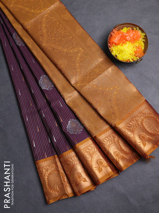 Semi soft silk saree deep wine and dark mustard with allover silver & gold zari weaves & buttas and zari woven border