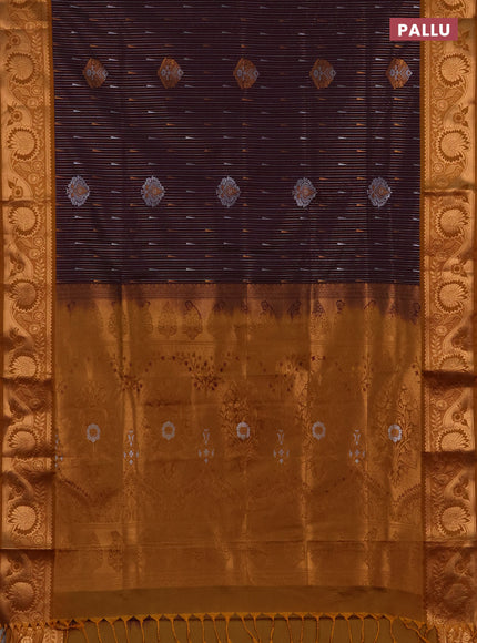 Semi soft silk saree deep wine and dark mustard with allover silver & gold zari weaves & buttas and zari woven border