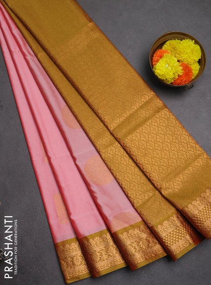 Semi soft silk saree pink shade and dual shade of mehendi green with zari woven buttas and zari woven border