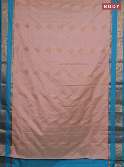 Semi soft silk saree peach shade and cs blue with allover zari woven buttas and rettapet zari woven border