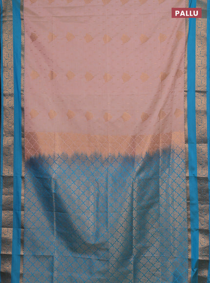 Semi soft silk saree peach shade and cs blue with allover zari woven buttas and rettapet zari woven border