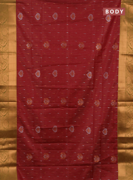 Semi soft silk saree maroon and dual shade of green with allover silver & gold zari weaves & buttas and zari woven border