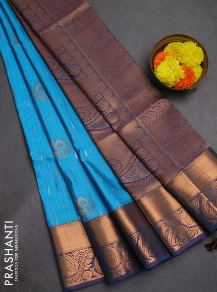 Semi soft silk saree cs blue and peacock blue with allover silver & gold zari weaves & buttas and zari woven border