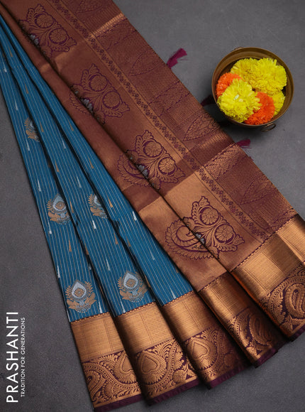 Semi soft silk saree peacock blue and deep wine with allover silver & gold zari weaves & buttas and zari woven border