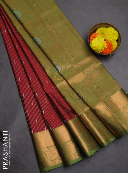 Semi soft silk saree maroon and green with allover silver & gold zari weaves & buttas and zari woven border