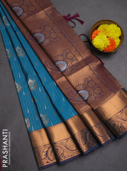 Semi soft silk saree teal green with allover silver & gold zari weaves & buttas and zari woven border