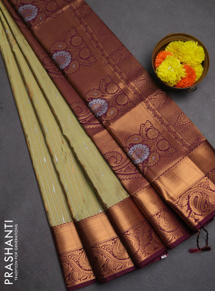Semi soft silk saree pista green and wine shade with allover silver & gold zari weaves & buttas and zari woven border