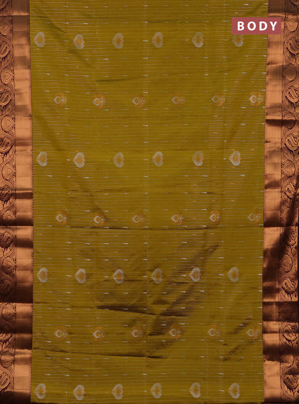 Semi soft silk saree mustard green and wine shade with allover silver & gold zari weaves & buttas and zari woven border