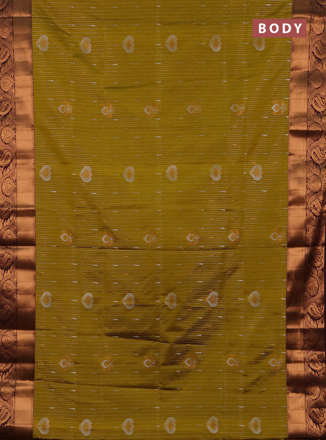 Semi soft silk saree mustard green and wine shade with allover silver & gold zari weaves & buttas and zari woven border