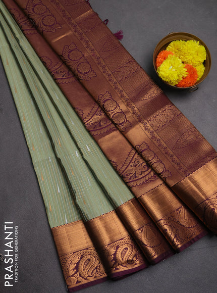 Semi soft silk saree pista green and wine shade with allover silver & gold zari weaves & buttas and zari woven border