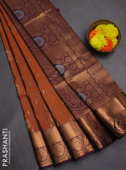 Semi soft silk saree rust shade and wine shade with allover silver & gold zari weaves & buttas and zari woven border