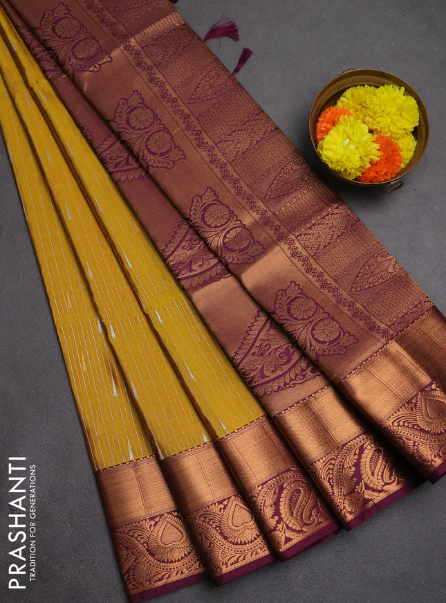 Semi soft silk saree mustard yellow and wine shade with allover silver & gold zari weaves & buttas and zari woven border
