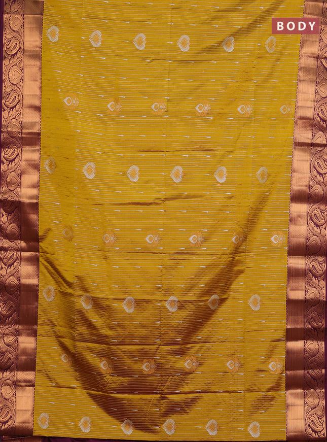 Semi soft silk saree mustard yellow and wine shade with allover silver & gold zari weaves & buttas and zari woven border