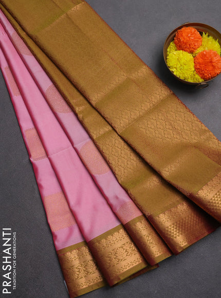 Semi soft silk saree light pink and lime green with zari woven buttas and zari woven border
