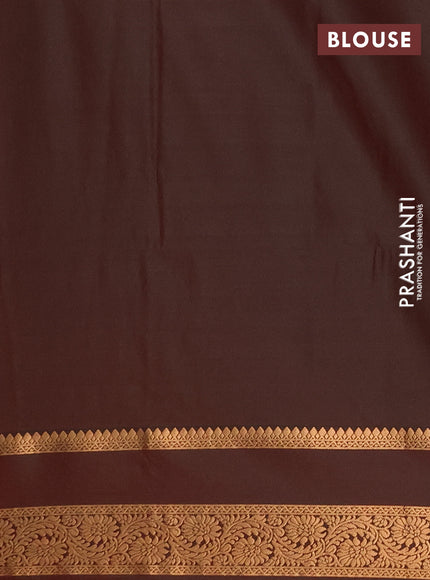 Semi soft silk saree rust shade and manthulir green with allover zari woven buttas and rettapet zari woven border