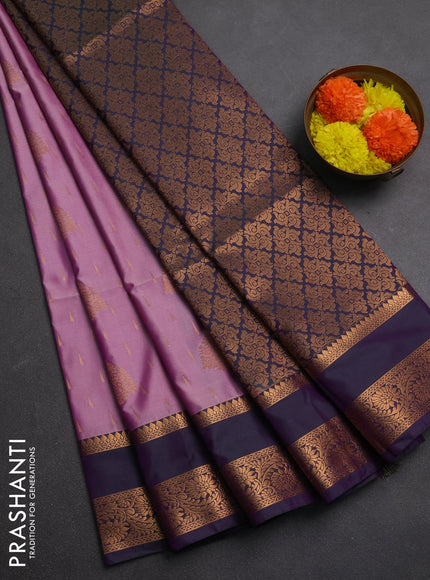 Semi soft silk saree mauve pink and jamun with allover zari woven buttas and rettapet zari woven border