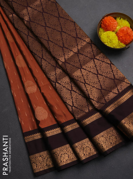 Semi soft silk saree rust shade and deep wine with allover zari woven buttas and rettapet zari woven border