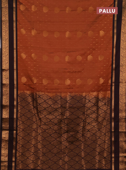 Semi soft silk saree rust shade and deep wine with allover zari woven buttas and rettapet zari woven border