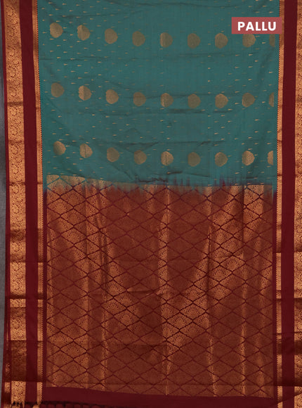 Semi soft silk saree teal green and maroon with allover zari woven buttas and rettapet zari woven border