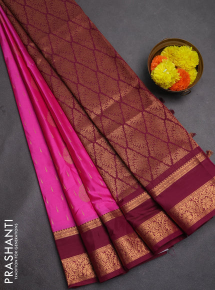 Semi soft silk saree pink and wine shade with allover zari woven buttas and rettapet zari woven border