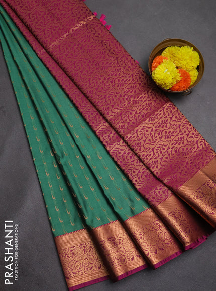 Semi soft silk saree teal green and magenta pink with allover zari woven muniya buttas and zari woven border