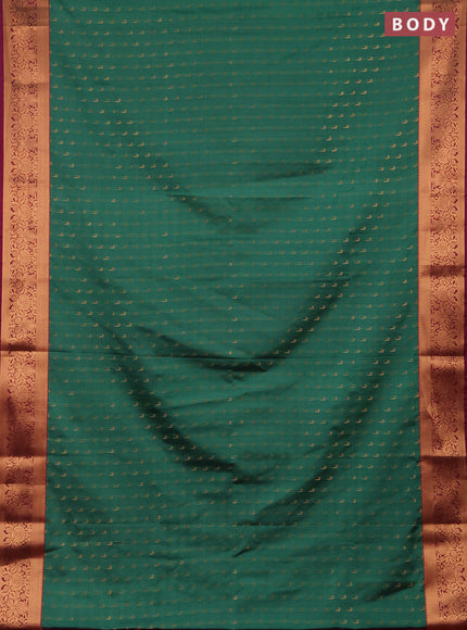 Semi soft silk saree teal green and magenta pink with allover zari woven muniya buttas and zari woven border