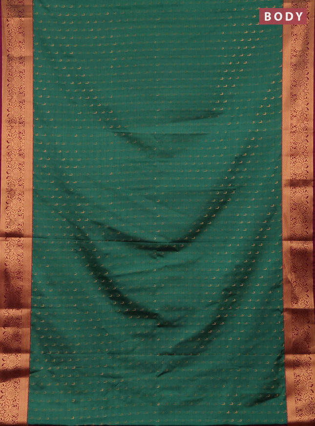 Semi soft silk saree teal green and magenta pink with allover zari woven muniya buttas and zari woven border
