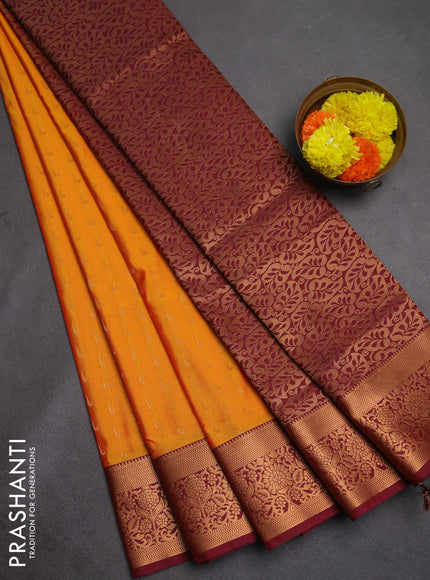 Semi soft silk saree dark mustard and maroon with allover zari woven muniya buttas and zari woven border
