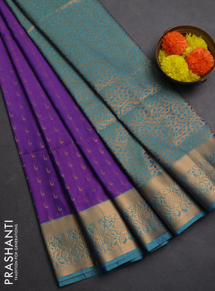 Semi soft silk saree purple and teal green with allover zari woven muniya buttas and zari woven border