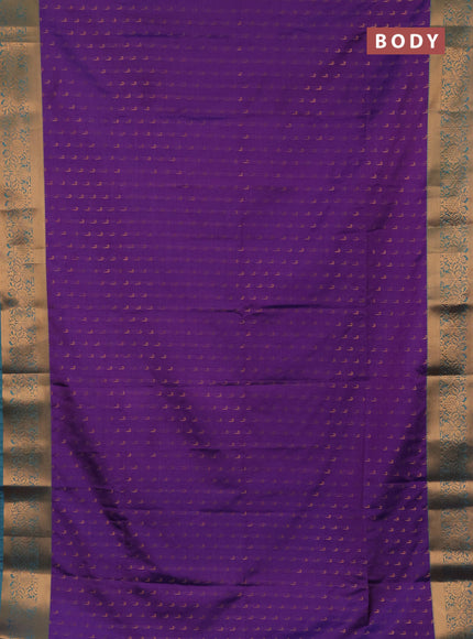 Semi soft silk saree purple and teal green with allover zari woven muniya buttas and zari woven border