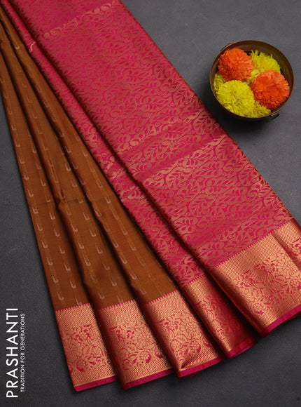 Semi soft silk saree dark mustard and pink with allover zari woven muniya buttas and zari woven border