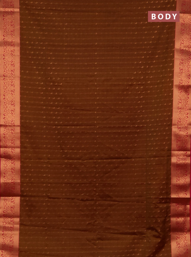 Semi soft silk saree dark mustard and pink with allover zari woven muniya buttas and zari woven border