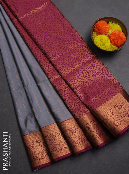 Semi soft silk saree grey and pink with allover zari woven muniya buttas and zari woven border