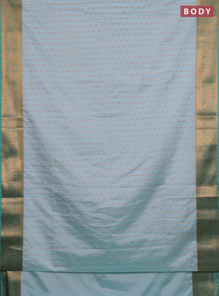 Semi soft silk saree teal shade and teal green with allover zari woven muniya buttas and zari woven border