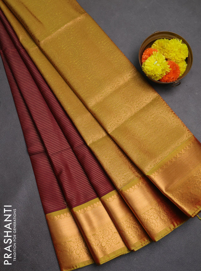 Semi soft silk saree maroon and dual shade of greenish maroon with allover zari weaves & buttas and rich zari woven border