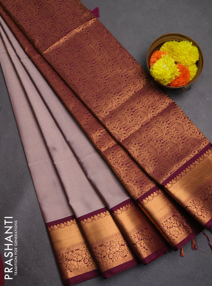 Semi soft silk saree dual shade of grey and wine shade with allover zari weaves & buttas and rich zari woven border