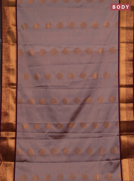 Semi soft silk saree dual shade of grey and wine shade with allover zari weaves & buttas and rich zari woven border