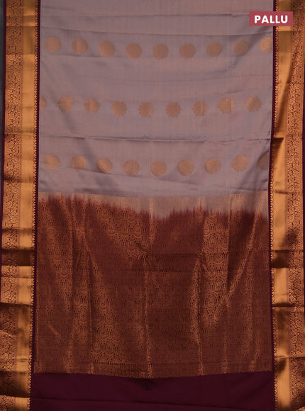 Semi soft silk saree dual shade of grey and wine shade with allover zari weaves & buttas and rich zari woven border