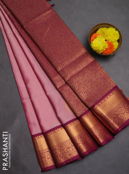 Semi soft silk saree light pink and wine shade with allover zari weaves & buttas and rich zari woven border