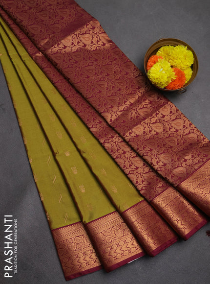 Semi soft silk saree mehendi green and maroon shade with allover zari woven buttas and zari woven border