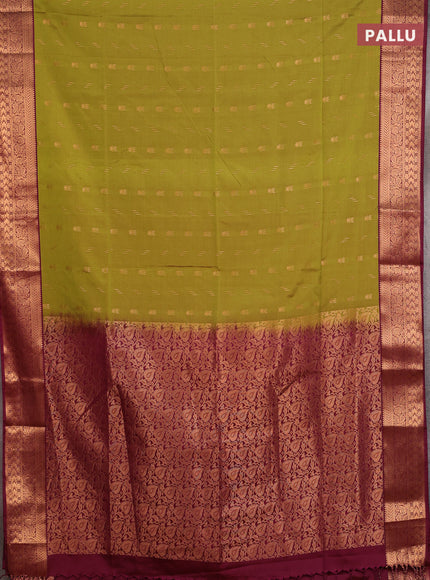 Semi soft silk saree mehendi green and maroon shade with allover zari woven buttas and zari woven border