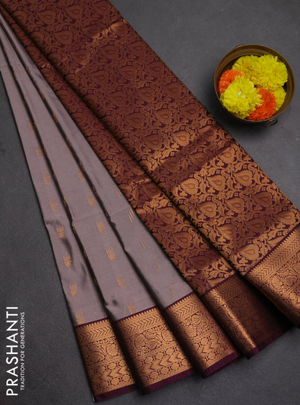 Semi soft silk saree grey and wine shade with allover zari woven buttas and zari woven border