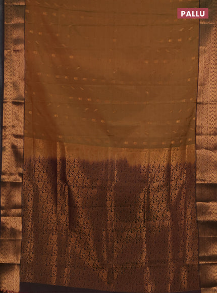 Semi soft silk saree dual shade of mustard green and bottle green with allover zari woven buttas and zari woven border