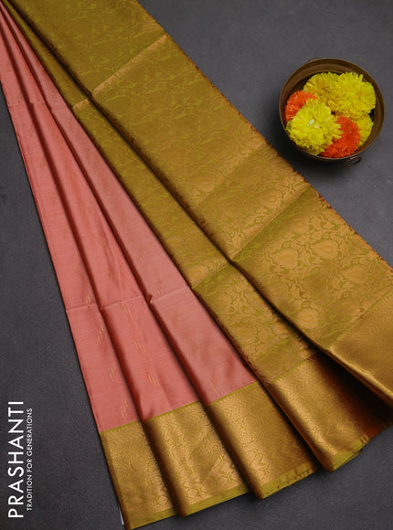 Semi soft silk saree peach shade and lime green with allover zari woven buttas and zari woven border