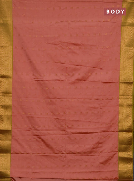 Semi soft silk saree peach shade and lime green with allover zari woven buttas and zari woven border