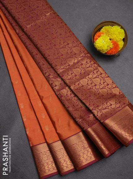 Semi soft silk saree rust shade and wine shade with allover zari woven buttas and zari woven border