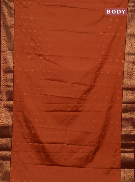 Semi soft silk saree rust shade and wine shade with allover zari woven buttas and zari woven border